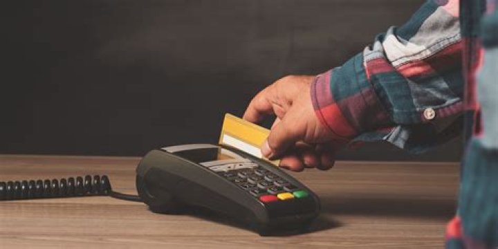 Can a shop charge you for paying by card?