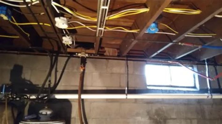 Can you staple Romex to bottom of joists?