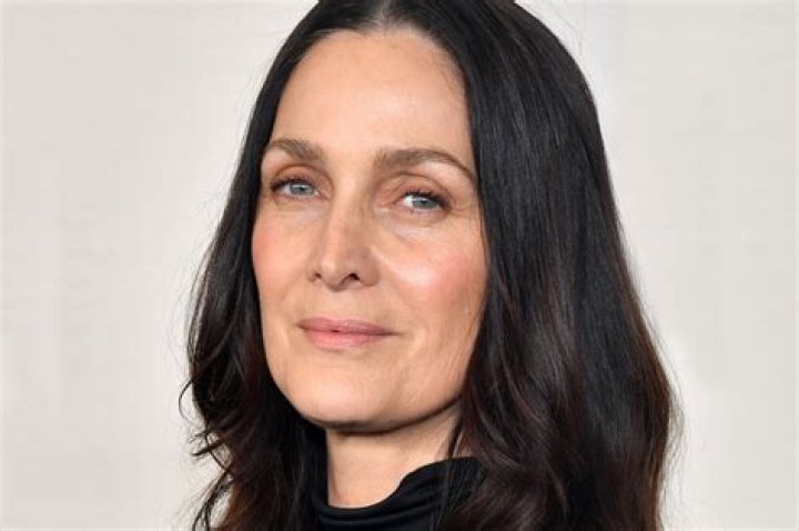 Carrie-Anne Moss (Movie Actress) - Age, Birthday, Bio, Facts, Family, Net Worth, Height & More