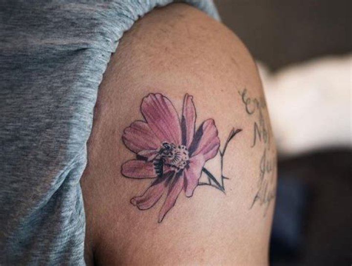 Drake Gets A "More Life" Flower Tattoo