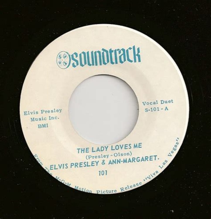 Elvis Presley’s
The Lady Loves Me Lyrics