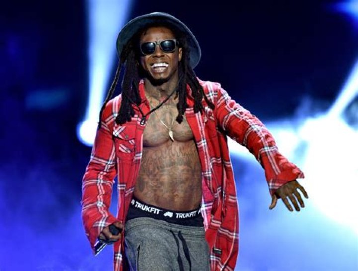 Lil Wayne Recalls Learning To Play Guitar