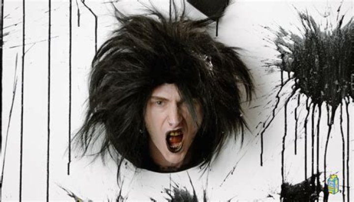 Machine Gun Kelly Shaves His Head For "Papercuts" Visual With Travis Barker