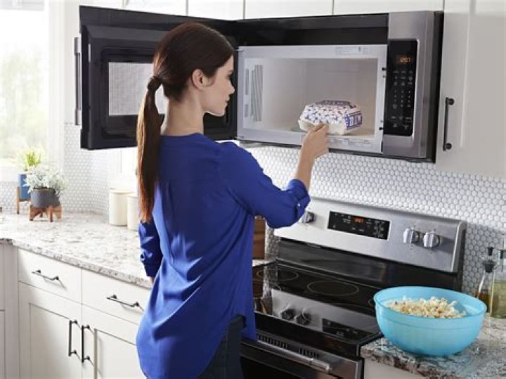 When did microwaves become common in homes?