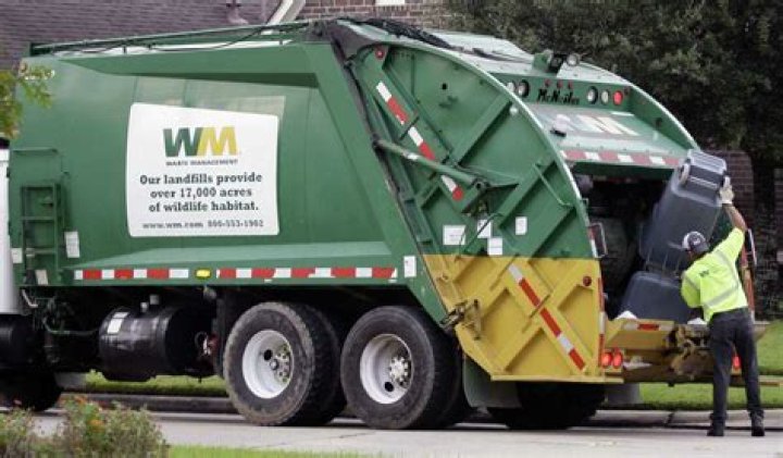 When did Waste Management Acquire Service Corporation of America?